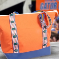 24 Pack insulated cooler with printed straps, and leatherette bottom.... from...