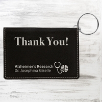 Leatherette ID Holder features a keychain and can be personalized with......