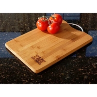 Bamboo cutting board with handle for easy carrying or hanging.... from ASI...