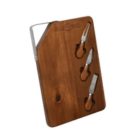Environmentally sustainable acacia wood cutting board with three cheese...