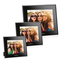 Beautiful black glass photo frame, holds a 4" x 6" photo.... from ASI 84592...