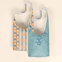 A crossbody, hobo-style tote, this bag fits snugly against your person......