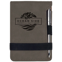 4.75" x 3.25" x 0.5" leatherette notepad and pen with elastic... from ASI...