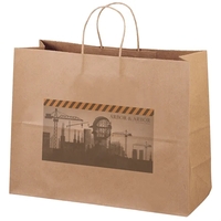 Eco-friendly brown kraft paper shopper with twisted paper handles and...