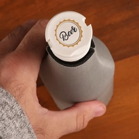 A versatile twist cap bottle opener and sealer that protects beverages......