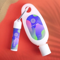 Carabiner kit containing lip moisturizer and hand and body lotion.... from...