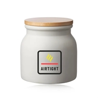 17 oz. ceramic container with matte white finish and bamboo lid.... from ASI...