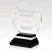 Polished optical crystal disk award with a multi-toned black granite base......