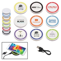 White Qi wireless puck smartphone charging pad with built-in "Foreign...