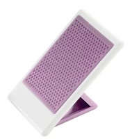 Travel phone stand with sticky surface and folding capability.... from ASI...