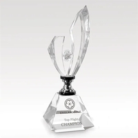 Optical crystal golf award that features polished stainless accents on a......