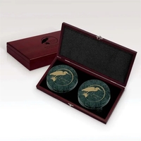 Green marble coasters nestled in a striking cherry-finished wood box.... from...