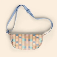 Our Crescent-shaped Luna Sling keeps your everyday essentials close, and...