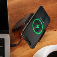 A 15W charger with an integrated kickstand that has multiple charging... from...