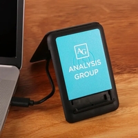 A 15W charger with an integrated kickstand that has multiple charging... from...