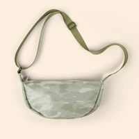 Our Crescent-shaped Luna Sling keeps your everyday essentials close, and...