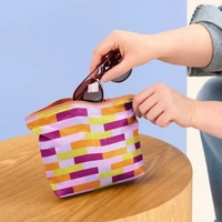 Tweedle Dee has a wide zippered closure & good sized gusset,... from ASI...