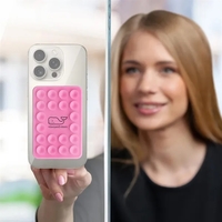 Sticking to virtually any surface, this attachment has an adhesive back......