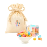 Fruit-infused sour gummies packed inside a reusable canvas gift bag.... from...