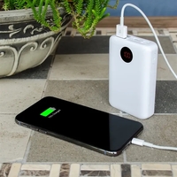 10000mAh power bank, featuring a digital display for easy battery...