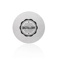 Stainless steel round coaster with a brushed polished finish and black......