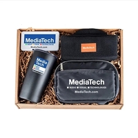 A modern combo of tech, drinkware, and writing essentials-perfect for...