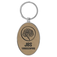 3" x 1 3/4" light brown PU leatherette/metal oval keychain with... from ASI...