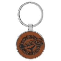 1 1/2" x 1 1/2" rawhide PU leatherette/metal round keychain with... from ASI...