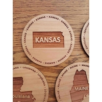 3.5" round wooden coasters with State of Kansas shape in the... from ASI...