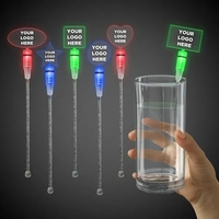9" clear acrylic cocktail stirrer with LED lights and topper.... from ASI...