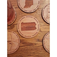 3.5" round wooden coasters with State of Pennsylvania shape in the... from...