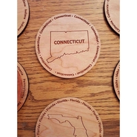 3.5" round wooden coasters with State of Connecticut shape in the... from ASI...