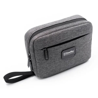 Travel organizer with adjustable interior, shockproof exterior, and mesh and...
