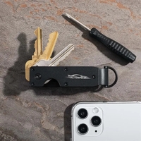 Aluminum key organizer holds 2-6 keys in a compact, jingle-free design......