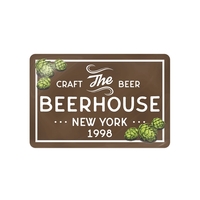 Thick, crystal-clear polyurethane is poured over each decal forming a dome......