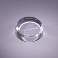 Heavy optic crystal paperweight with slanted top, deep etch imprint on......