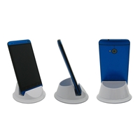 Spinning phone stand measuring 3.5" x 1.5" and available in several... from...
