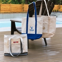 This heavy-duty canvas tote moves effortlessly from beach outings to...
