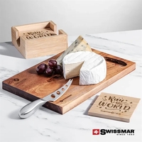 The Swissmar Acacia Board & Bamboo Coasters set creates an ambiance... from...