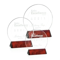 Starfire optical crystal circle award on rosewood finished aluminum base.......