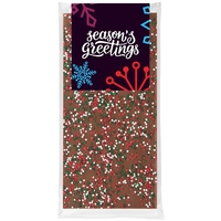 3.5 oz. Belgian chocolate bar topped with holiday nonpareil sprinkles;...