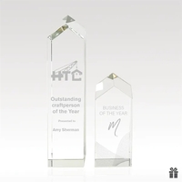 Optical crystal tower with sleek tapered design, reflects light and offers......