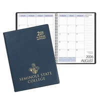 Wire bound academic monthly desk planner with continental vinyl cover.......