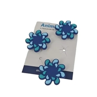 Customizable PVC shoe charms add color and personality to footwear,...