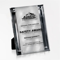 Silver plaque that's crafted from brushed and mirrored stainless metal...