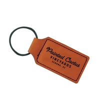 Engraved leatherette key fob with contrast stitching, split ring, and a......