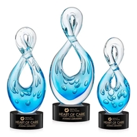 The Utopia Award features a striking, teardrop-inspired loop that twists...