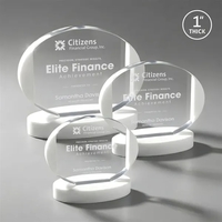The Darwin combines clear oval optical crystal with white crystal edging......
