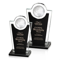 The striking starfire crystal award features a distinctive silhouette topped...