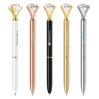 Brass twist-action ballpoint pen with a diamond crystal on top and... from...